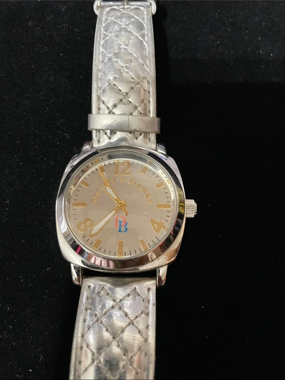 Dooney & Bourke Silver Quilted Leather Strap Watch with Gold Accents.